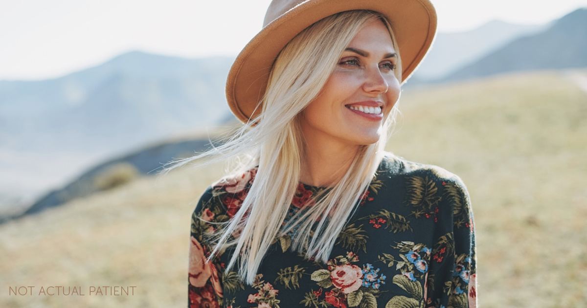 An advertisement image for fall specials at Southeastern Plastic Surgery, P.A.. The image features a woman in a hat smiling.