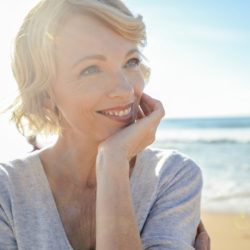 Beautiful mature woman portrait on the beach