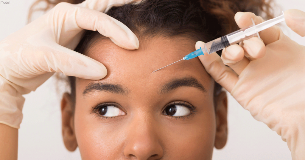 Woman receiving an injectable treatment