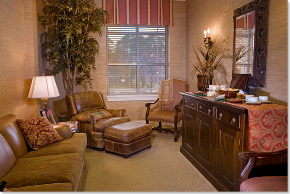 Waiting area with leather couches and chairs